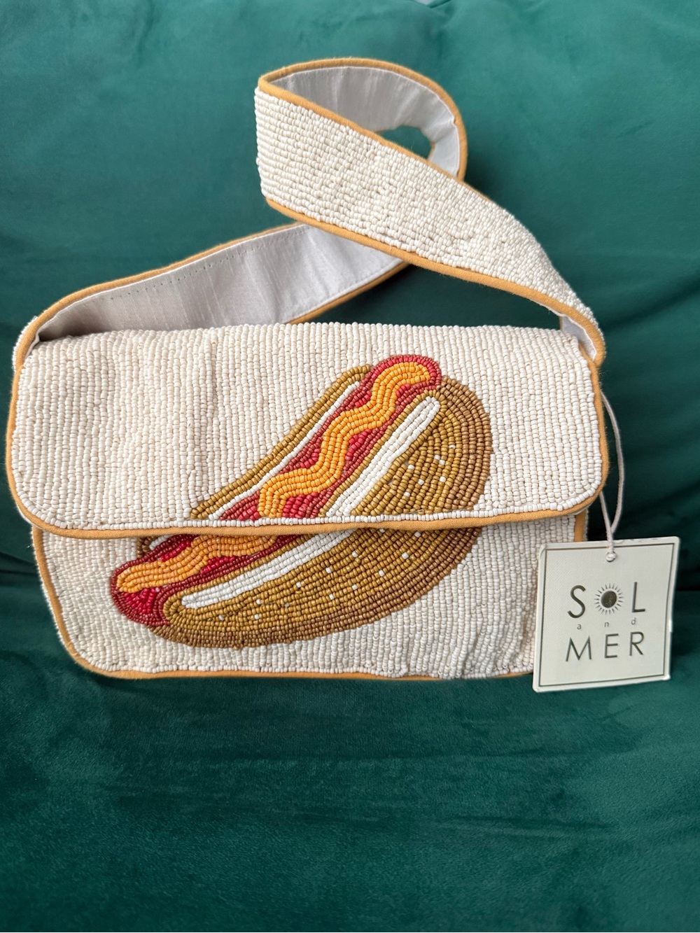 Sol and Mer Cream Beaded Hot Dog Crossbody Bag